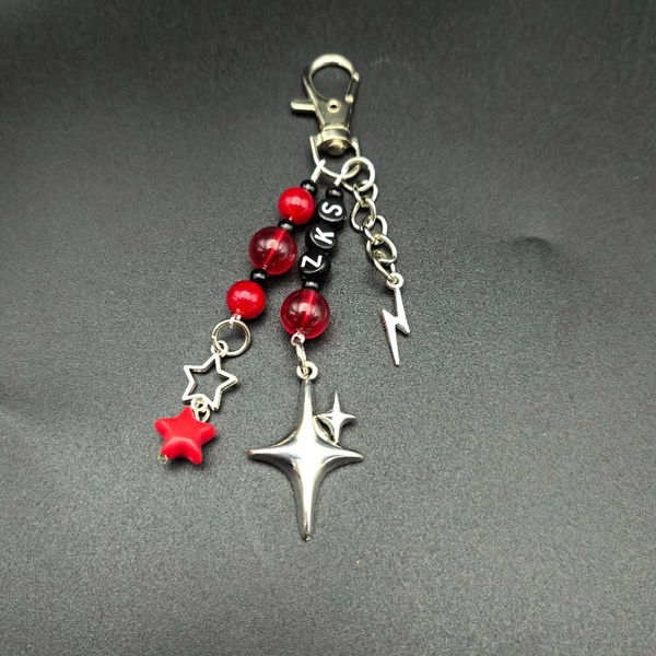 SKZ K-Pop Lightstick Charm Keychain - Black and Red Iron Pendant with Star Accents for Bags, Backpacks, and Purses - Kpop Merchandise Idol Fan Gift, Backpack Accessory | Playful Accessory | Durable Iron Material