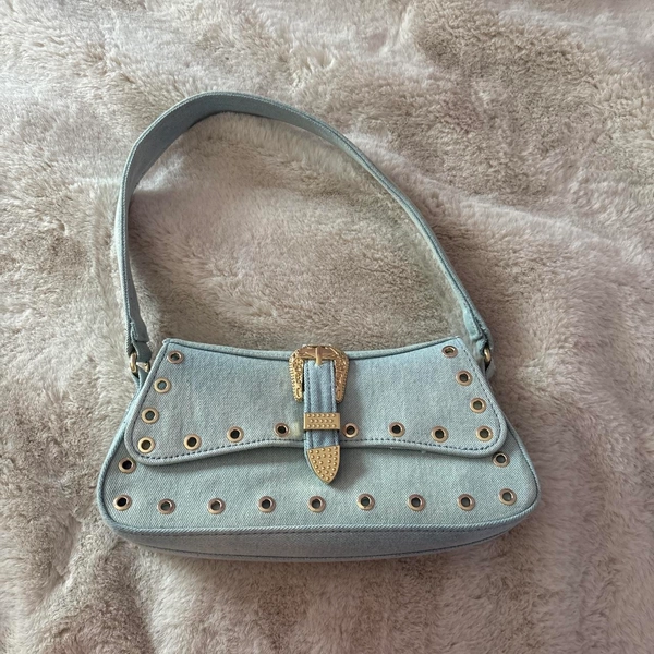 ON VACATION 7/20-7/25

Baby blue leather handbag...