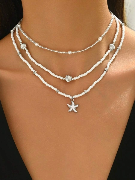 Set de 3 collares hechos a mano con cuentas de arroz y perlas falsas, con colgantes de estrella de mar y conchas de estilo playa y océano, adecuado para uso diario y vacaciones
