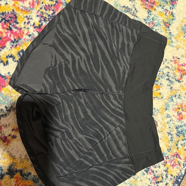 Lululemon black zebra print speed up shorts...