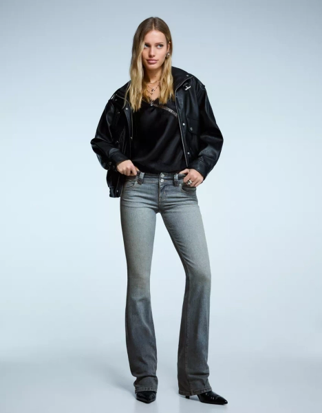 Low-rise bootcut jeans with flaps