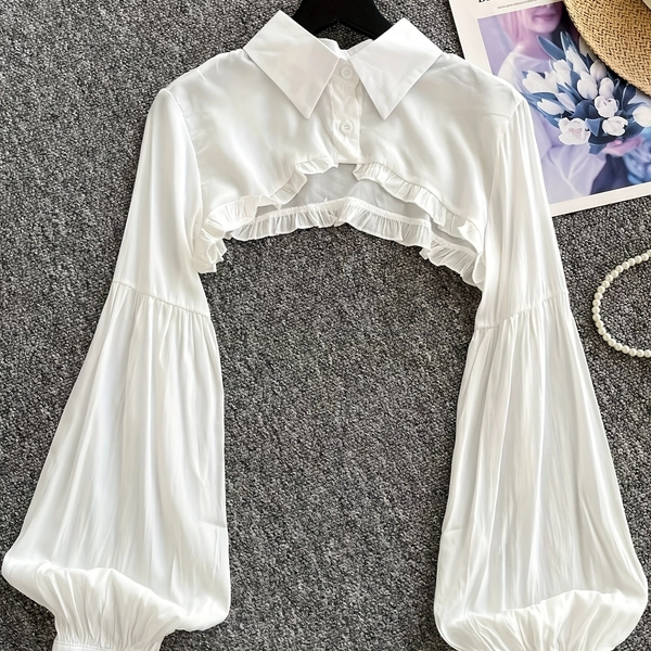A Chic and Versatile Short Cropped Lantern Sleeve Blouse/shawl Style Top for Women, Offering and Multiple Functions.