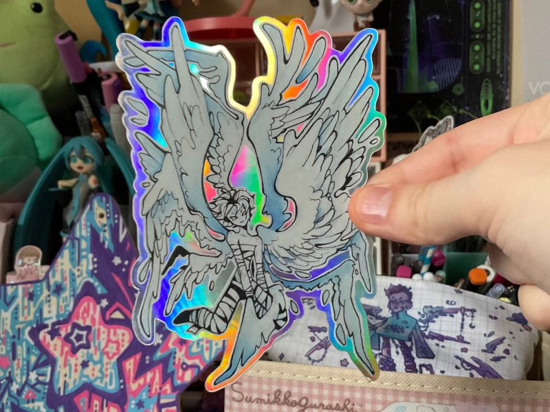 LIMITED EDITION!! Winged pilot, glossy holographic, vinyl sticker.