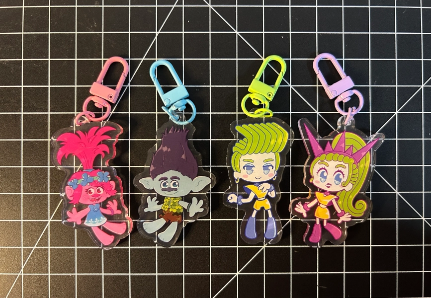 Trolls Double Sided Keychain Charms (Velvet and Veneer, Branch and Poppy)