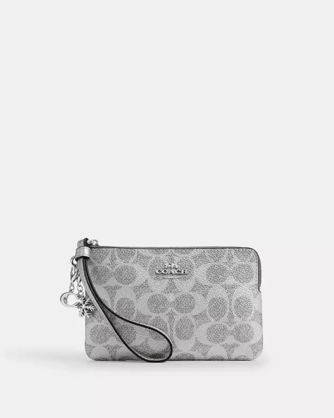 Silver Boxed Corner Zip Wristlet In Signature Canvas With Charms