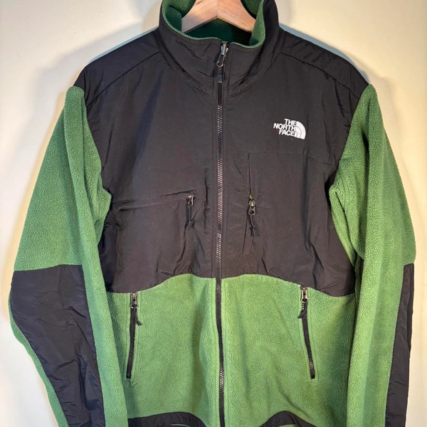 The North Face green and black fleece zip up, one of...