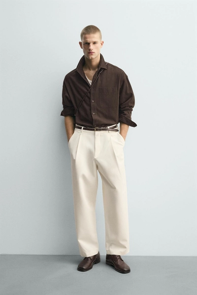 PANTALÓN RELAXED FIT PLIEGUES