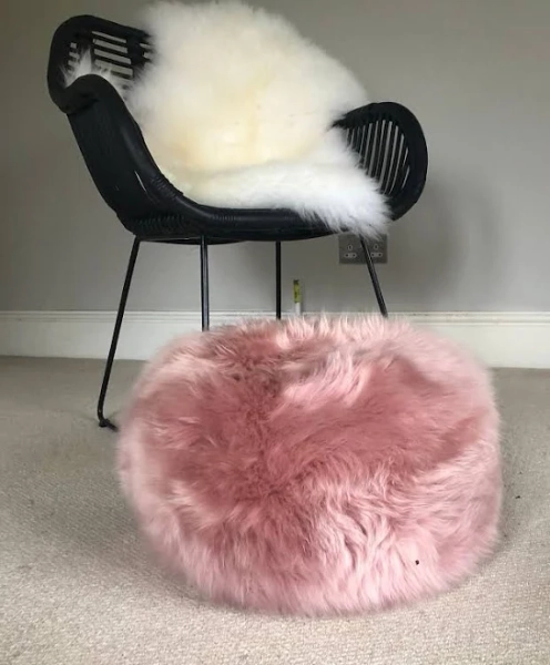 Pink fluffy pouffe, dusky pink sheepskin, pink sheepskin pouffe, dusky pink bedroom, interior decor, hygge, interior accessory, pink fur,
