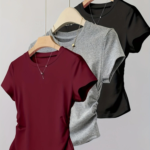 A Women'S Short-Sleeved T-Shirt in a Solid Color, Featuring a Round Neck And a Design That Emphasizes a Waist-Cinching Fit, Perfect for Casual Sportswear