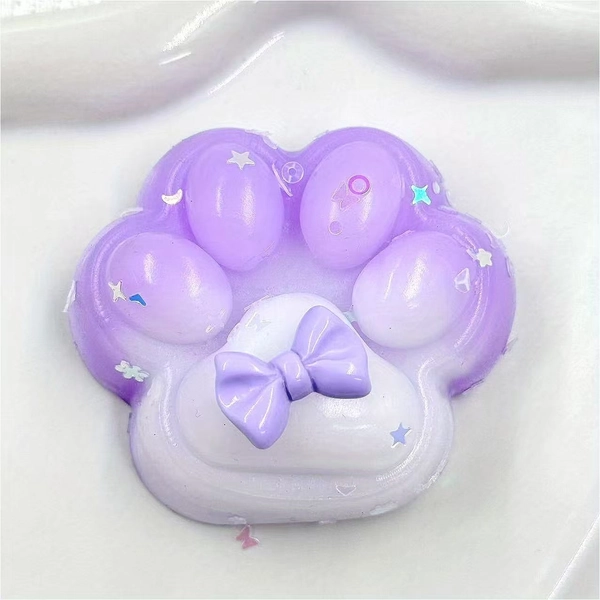 Squishy Sensory Fidget Toy with Glitter Paw Print & Heart Eyes - Cute Purple & Pink TPR Slime-Filled Kawaii Cat Paw Pressable Stress Ball, Birthday Party Favors, Calming Gift for Adults & Teens, Colorful Cat Paw Squishy with Bow & Star Confetti, Relaxing Toy for Parties & Gifts