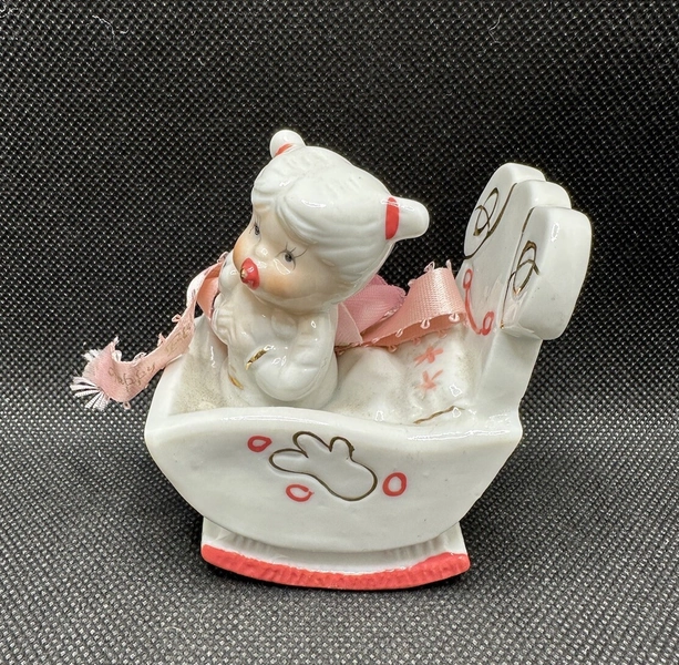 Vintage Toma Porcelain Baby Girl w/ Pacifier in Cradle Pink Figurine 3" Taiwan