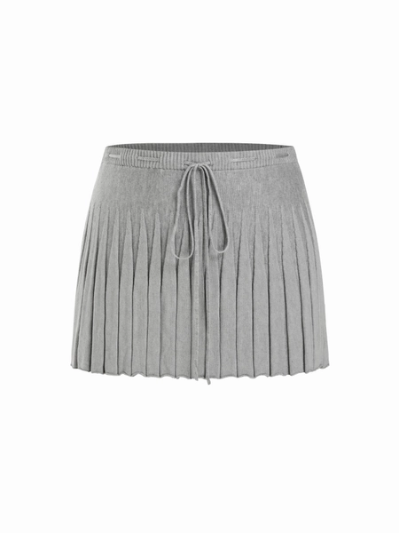 Jupe mini plissée nouée en maille taille moyenne
