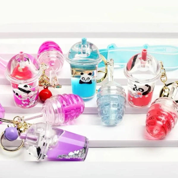 Wholesale Transparent Lip Plumper Fruit Flavor Kid Lipgloss Lips Care Oil Clear Lip Gloss With Ball Key Chain Cute Kids Lipgloss Peach Tea Cup Lip