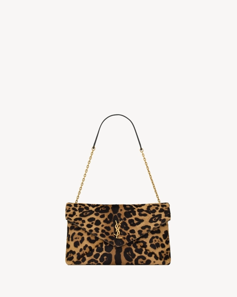 CASSANDRE pouch on chain in pony hair leather