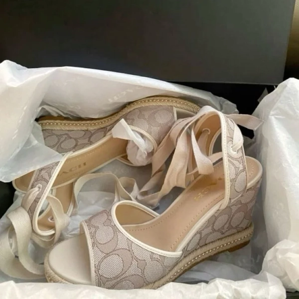 COACH Women's Page Signature Ankle-Tie Wedge Sandals in the Stone/Chalk colorway