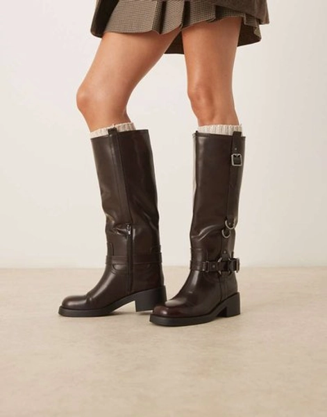 ASOS DESIGN Cobra buckle harness knee boots with silver hardware in burgundy-Red