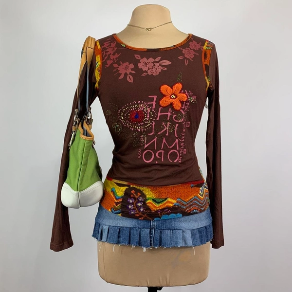 Y2K Patchwork Floral Long Sleeve Top 

Y2K Nikky...