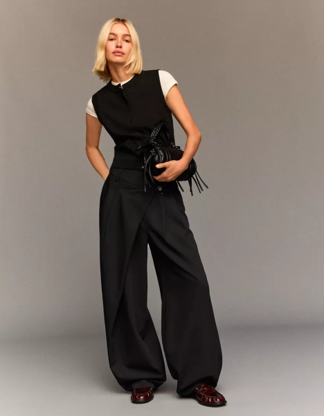 Tailored pants with crossover waistband