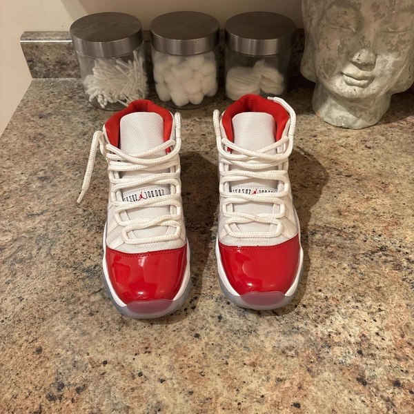 Retro 11 Jordan Cherry Red
Kids 6 
Used minor scuff