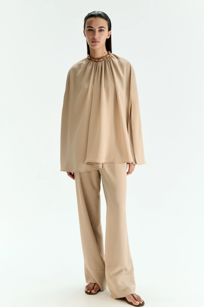 Bead-detail cape blouse