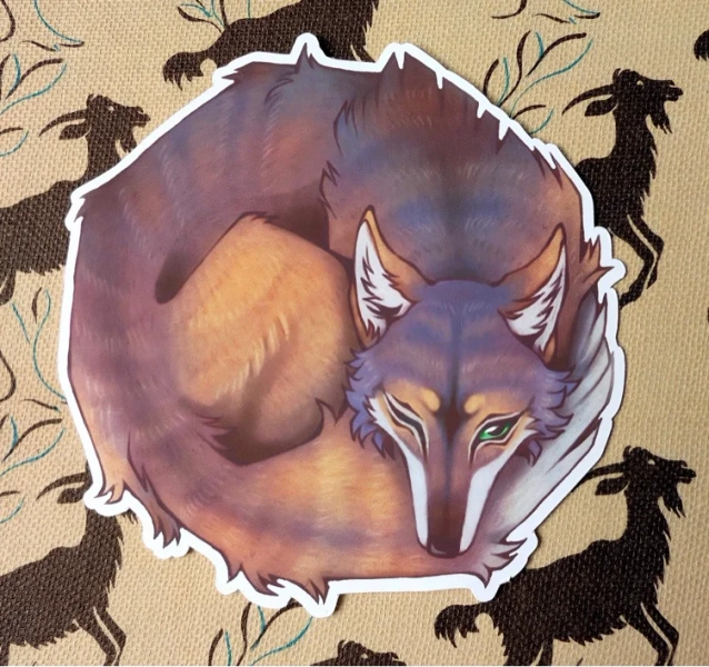 Napping Coyote Sticker
