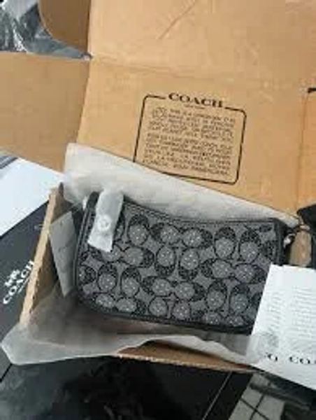 Coach Black crystal in Signature Jacquard swinger 20