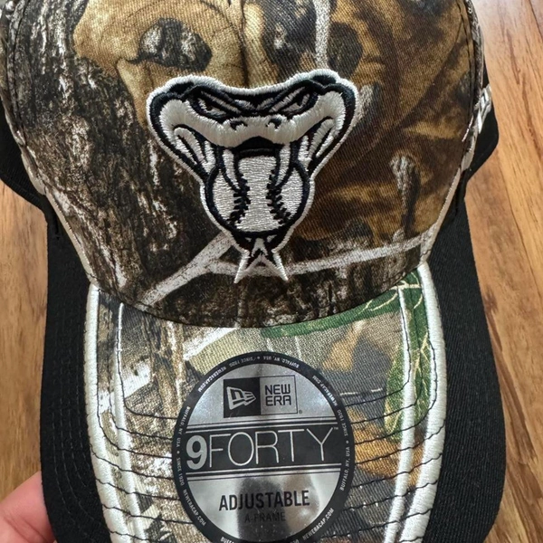 New Era 9FORTY Camo Snake Snapback Cap
Adjustable...