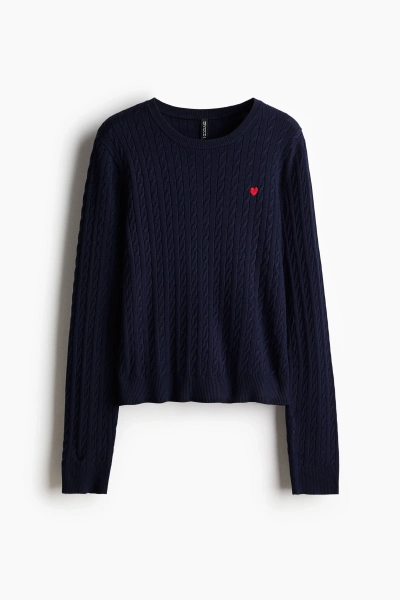 Sweater en punto trenzado