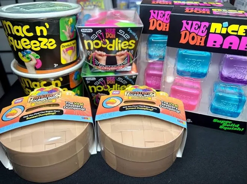 LOT OF (8) NeeDoh & RMS Sunset Mystery Dumpling Lot (8) Pieces New & Sealed 2x Nice Ice Baby Packs, 2x Mac n' Squeeze, 2x Noodlies & 2xRMS Dumplings
