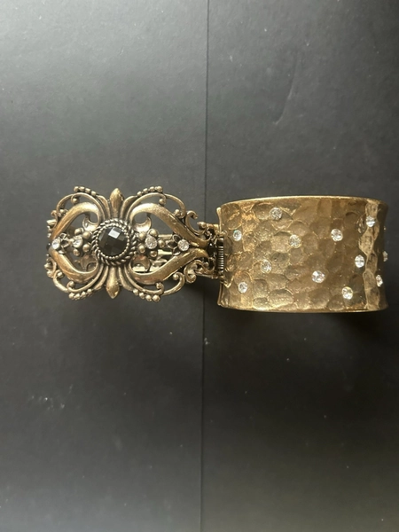 Two Gold Toned Cuff Bracelets 252