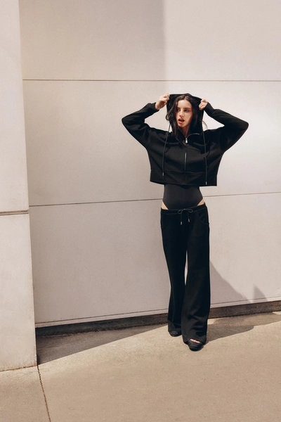 INTERLOCK FLARED TROUSERS - Black - l