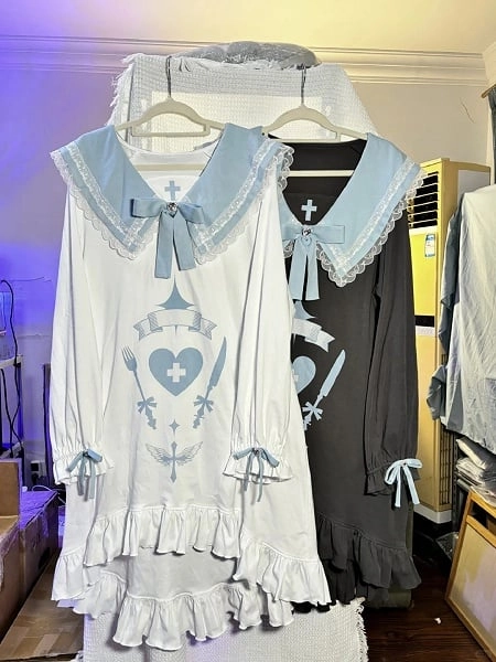 [£28.60]Jirai Kei Light Blue Sailor Dress with 'Angel's Dinner' Print, Winged Lace Collar & High-Low Hem