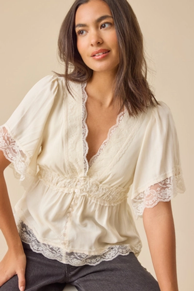 
        Evanelle Lace Babydoll Top in Cream | Altar'd State
    