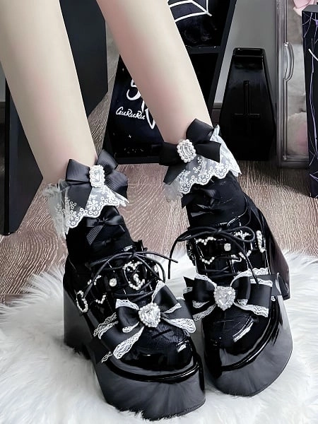 [$67.00]Jirai Kei Black PU Mary Janes: Platform Heel with Bow & Heart Rhinestone and Toe Cross Embroidery