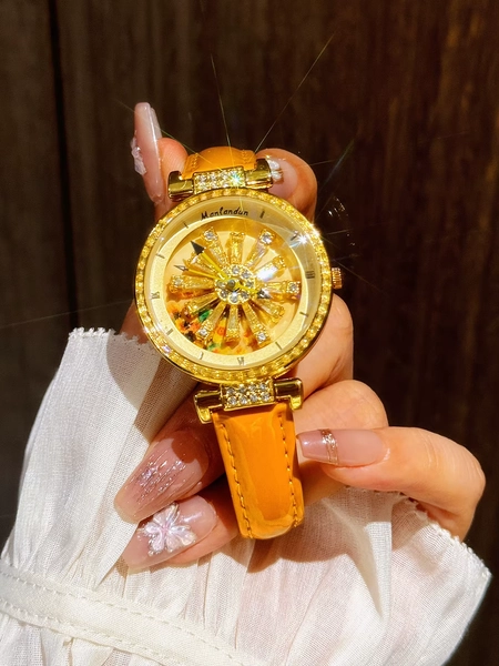 A stylish women's watch with a transparent back and diamond embellishments, featuring a rotating starry sky dial and a sunflower - AliExpress 1511