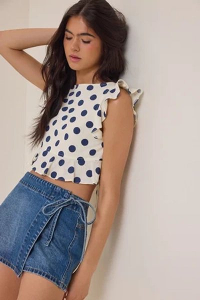 
        Dixie Side Tie Denim Skort in Medium Dark | Altar'd State
    