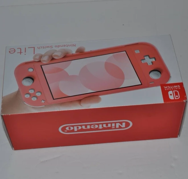 Brand Nintendo Switch Lite Coral In Color