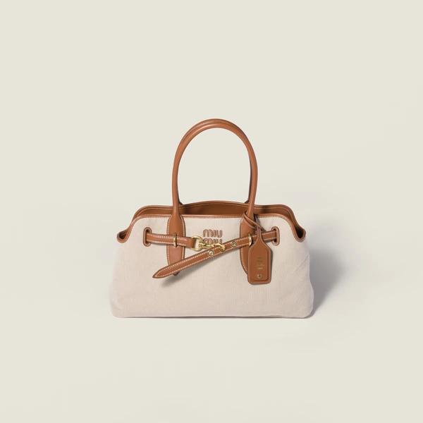 Borsa Aventure in canvas e pelle