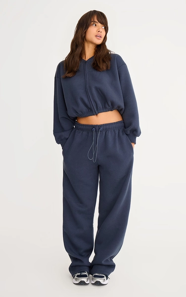 Jogging oversize bleu marine à cordons ajustables sur la taille