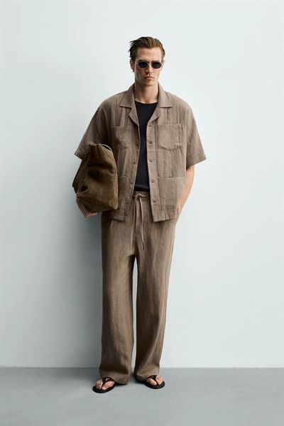 RELAXED FIT 100% LINEN SHIRT WITH PLEATED POCKETS
