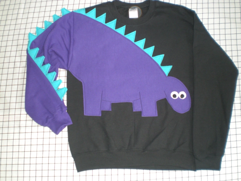 Dinosaur sweatshirt, Dinosaur shirt with spikey tail sleeve, Adult sweatshirt, Adult sizes, your choice of color and size.