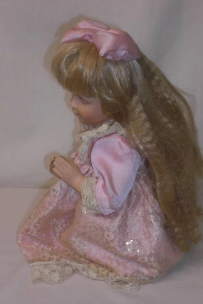 Leonardo Collector's Porcelain Doll: Kneeling Doll with Pink Dress and Crimped Hair