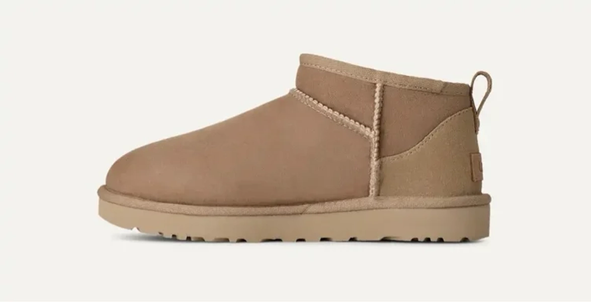 UGG® Women's Classic Ultra Mini Sheepskin Classic Boots in Sand, Size 8