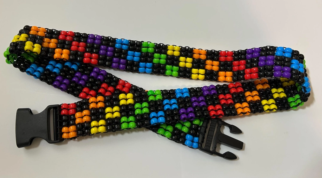 Black and Rainbow checkered Kandi belt opaque, glow in the dark & glitter