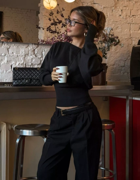 Asymmetric sweater with ribbed hem