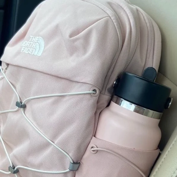 a pink The North Face