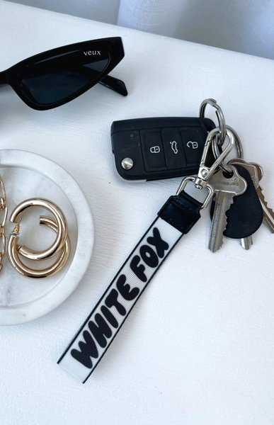 Next Level Strap Keychain Black/White – White Fox Boutique US | Clothes & Accessories | Shop Online