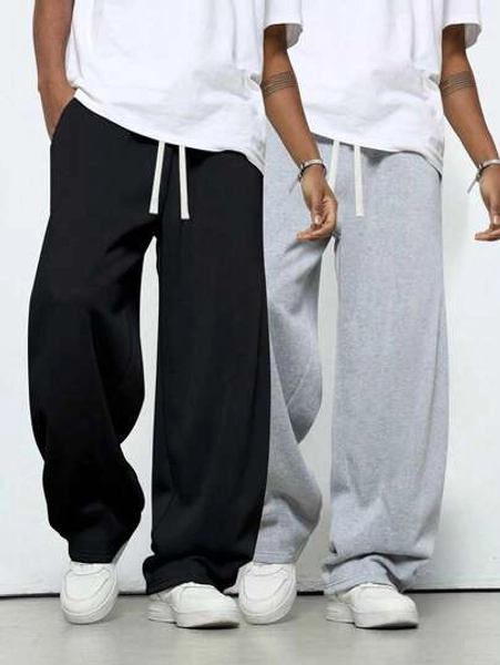 Men's Loose And Fashionable Sporty Long Pants, Featuring A Casual And Simple Solid Color Wide-Leg Design, With Drawstring At The Waist And Large Pockets, Suitable For Daily Strolls, Work, Travel, Etc