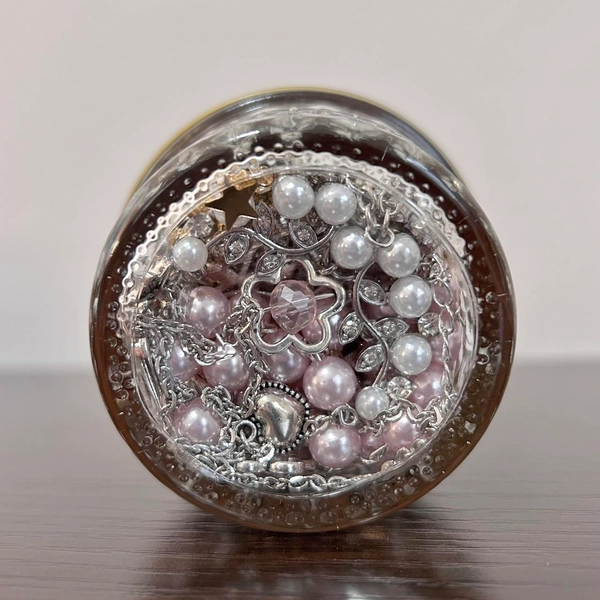 Mixed Metals Mystery Jewelry Jar.

• Comes with...