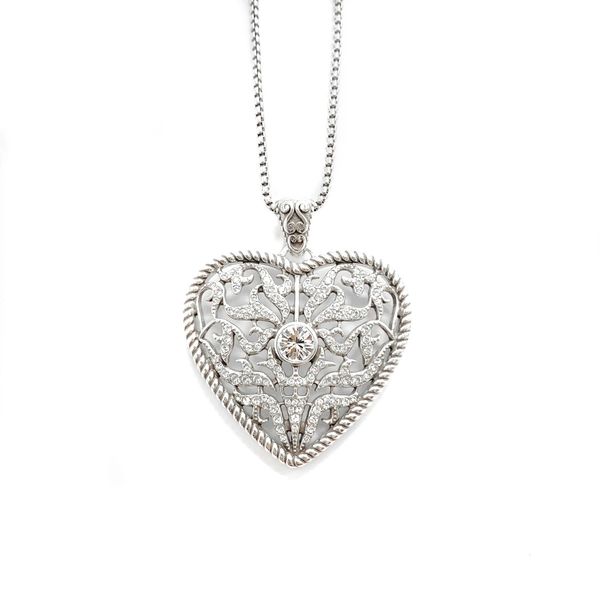 Silver-Plated Hollow Filigree Heart Necklace with Clear Crystals